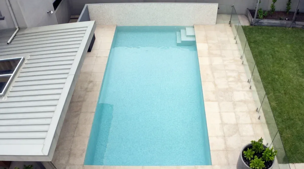 Fully tiled pool renovation in Balwyn, Melbourne — completed backyard transformation