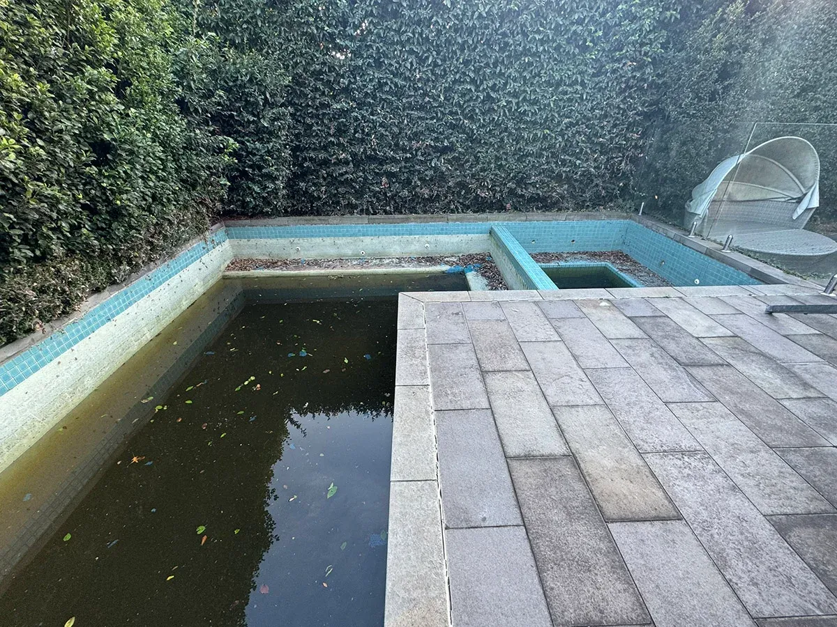 Deepdene swimming pool before renovation — weathered and dated surface