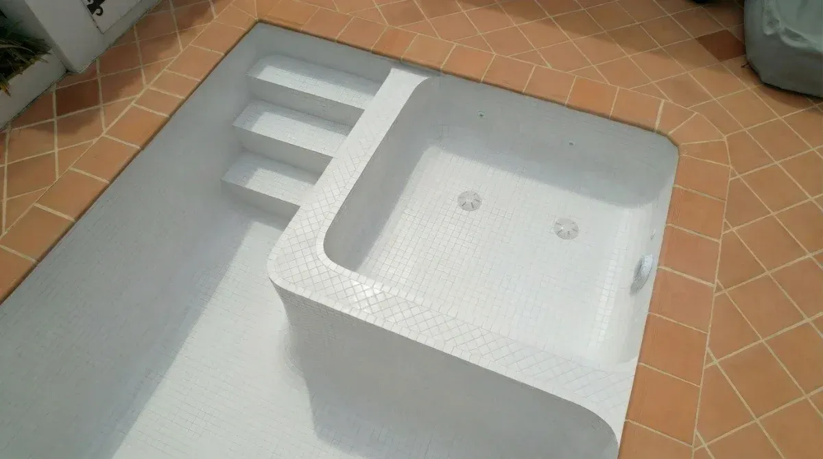 Ceramic pool tiles being installed in Melbourne bayside pool